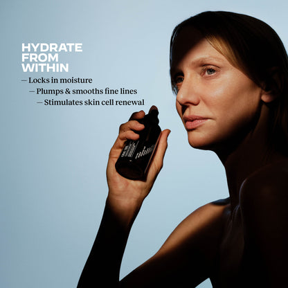 Woman holding an OM-SE Hydrating Face Mist with skin benefits text on blue background: hydrate from within, Locks in moisture, plumps and smooths fine lines, stimulates skin cell renewal.